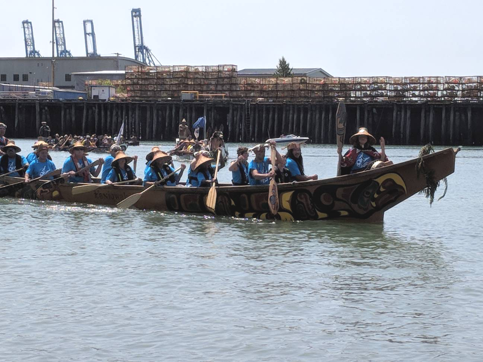 Power Paddle to Puyallup, 2018. Each canoe family paddled to shore after an eloquent exchange with the Puylallup tribal leadership. Representatives from the canoe family would request permission to land through song, prayer, and verse, before permission was granted in an equally articulate manner by the Puyallup Indian Tribe.